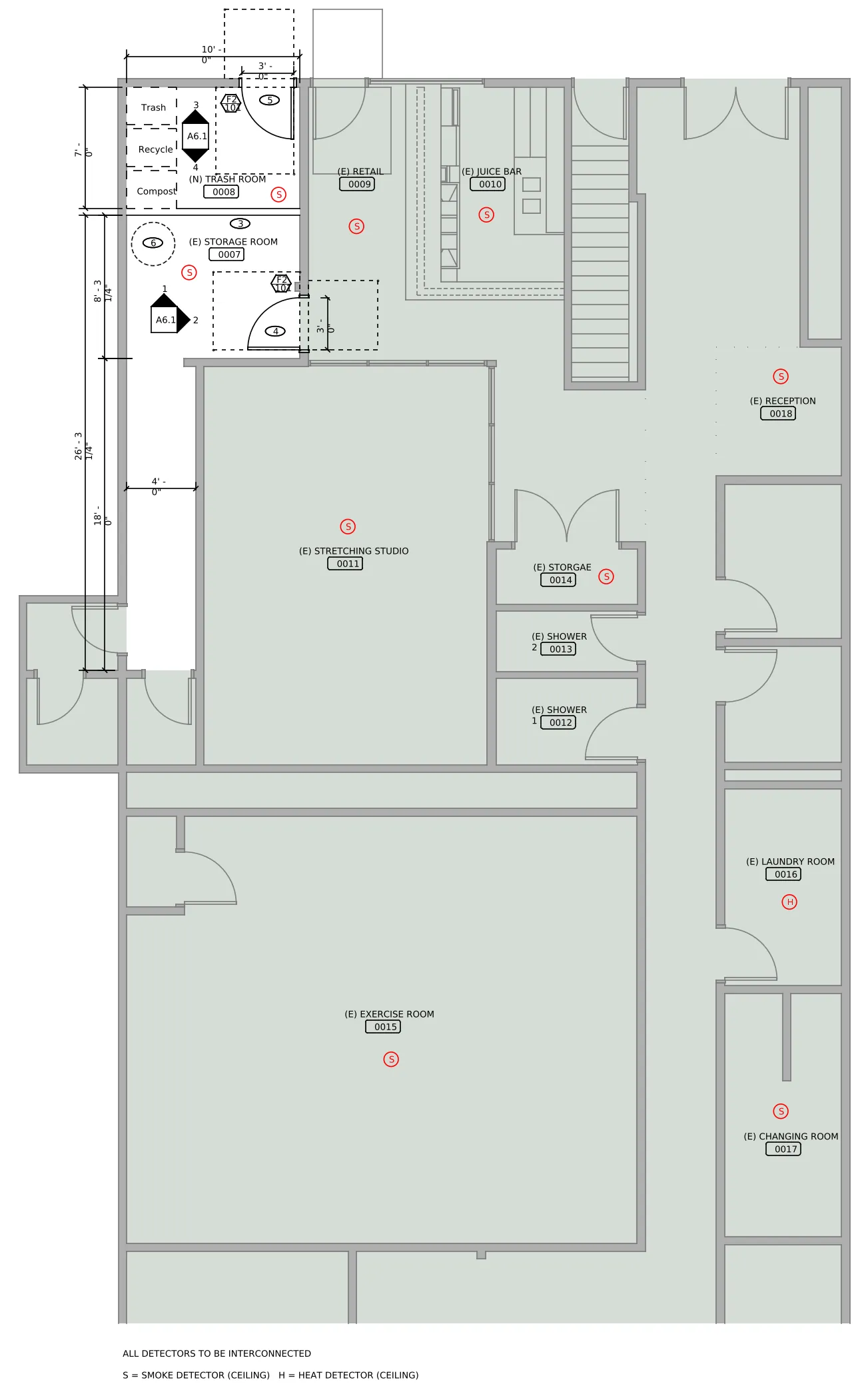 The same floor plan after the request, with a smoke detector in each listed room, a heat detector in the laundry room and none in the showers