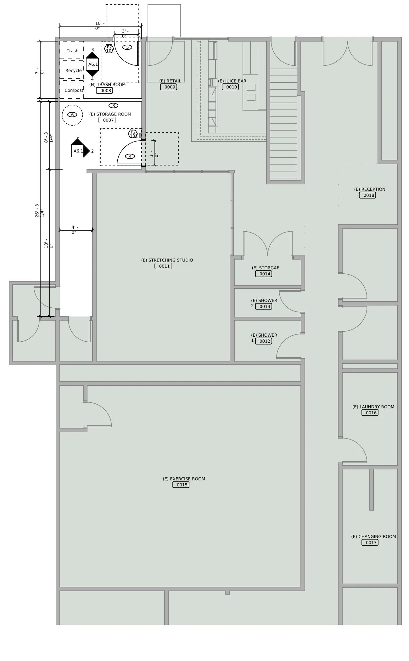 AutoCAD floor plan of a fitness studio before the request, with room name tags and no fire alarm devices